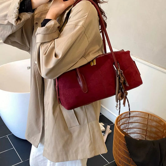Elegant Suede Shoulder Bag with Pendant