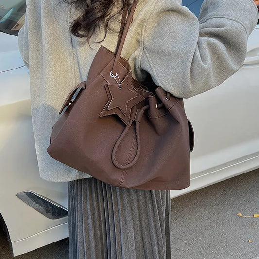 Chic Drawstring Bucket Handbag with Star Charm